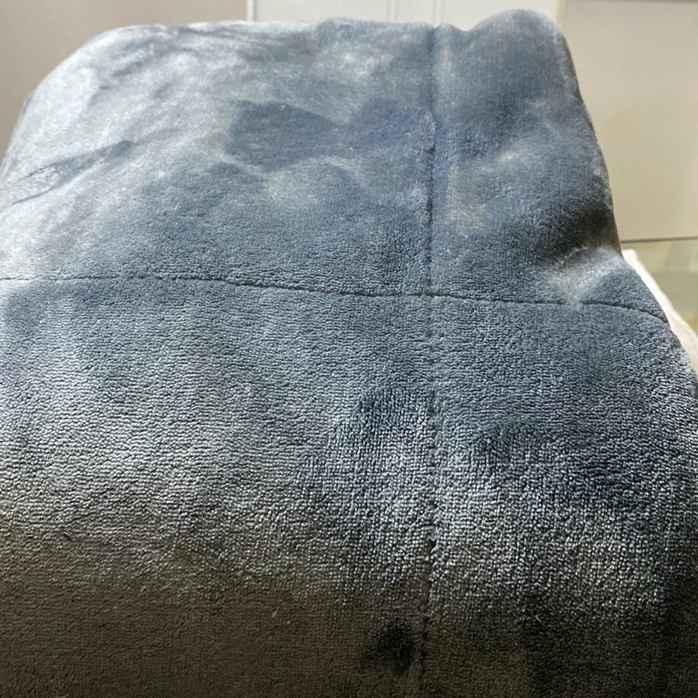 Cuddl Duds fluffy, cuddly throw blanket.